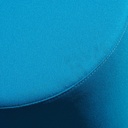 Round ottoman upholstered in various colorful fabric