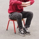Stackable school chair with red tubular steel legs