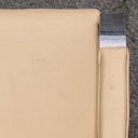 Armchair in chromed steel and synthetic leather