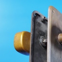 Double door pull handle with key and fixing holes in sand-cast bronze by Jules Wabbes from the Générale de Banque - Fixed (Right/Left)