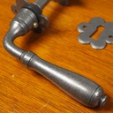 Door handle with key rosettes by Linea Bertomani