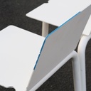 White stackable chair by Pierre-Emmanuel Vandeputte (with various coloured corners)