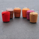 Round ottoman with belt by Satelliet (various colors/finishes)
