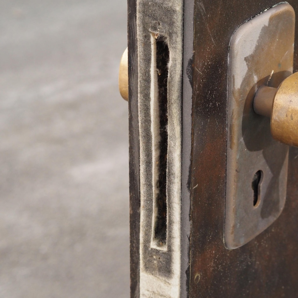 Door in veneered wood with bronze door handles by Jules Wabbes (H. 252,2 x 101 cm)