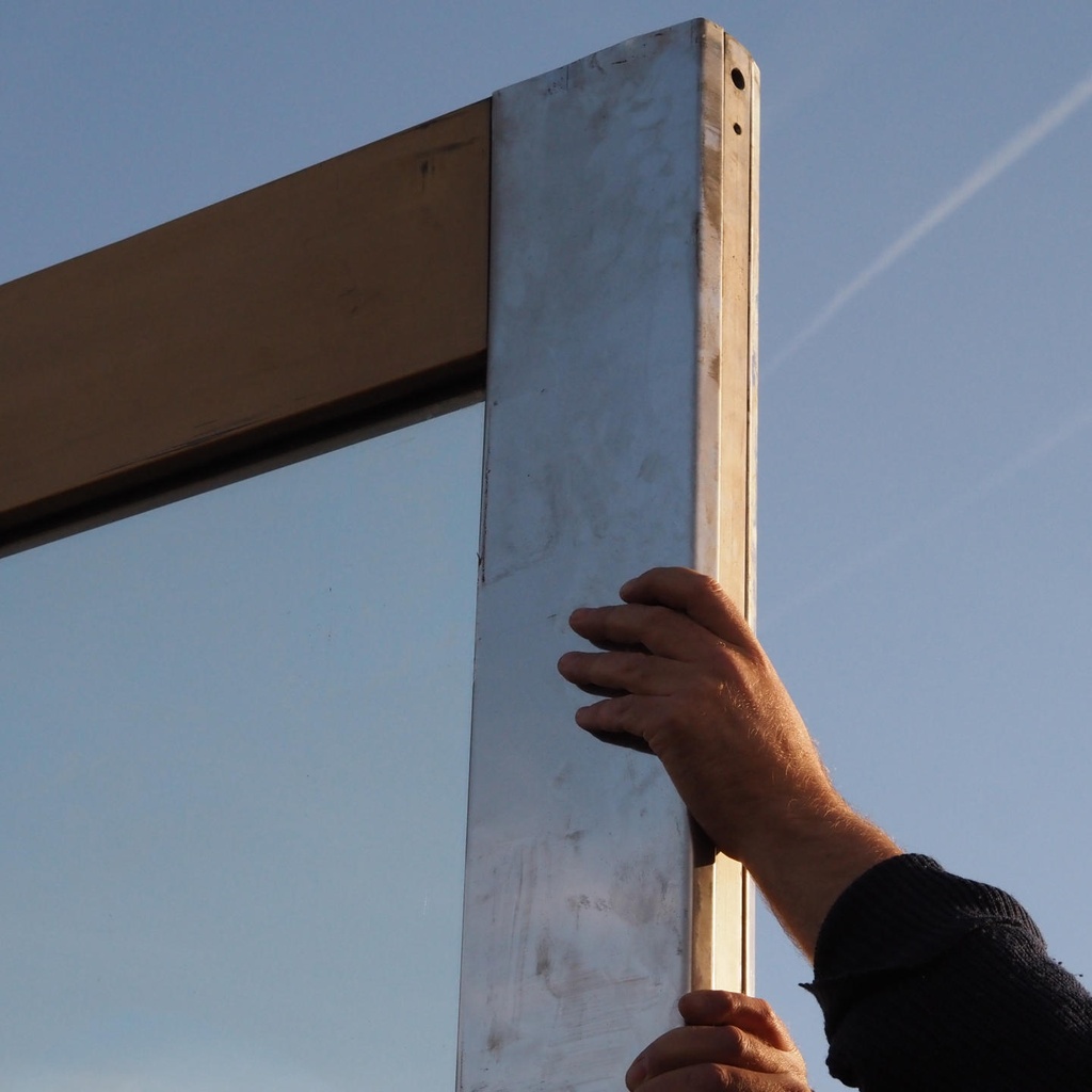 Glass door in stainless steel and bronze from the main entrance of the Générale de Banque(H. 235,5 x 108 cm)