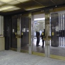 Glass door from the main entrance of the Générale de Banque (H. 235,5 x 108 cm)