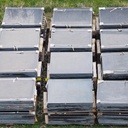 Square slab in black gabbro from the Montparnasse train station complex (115 x 115 cm)