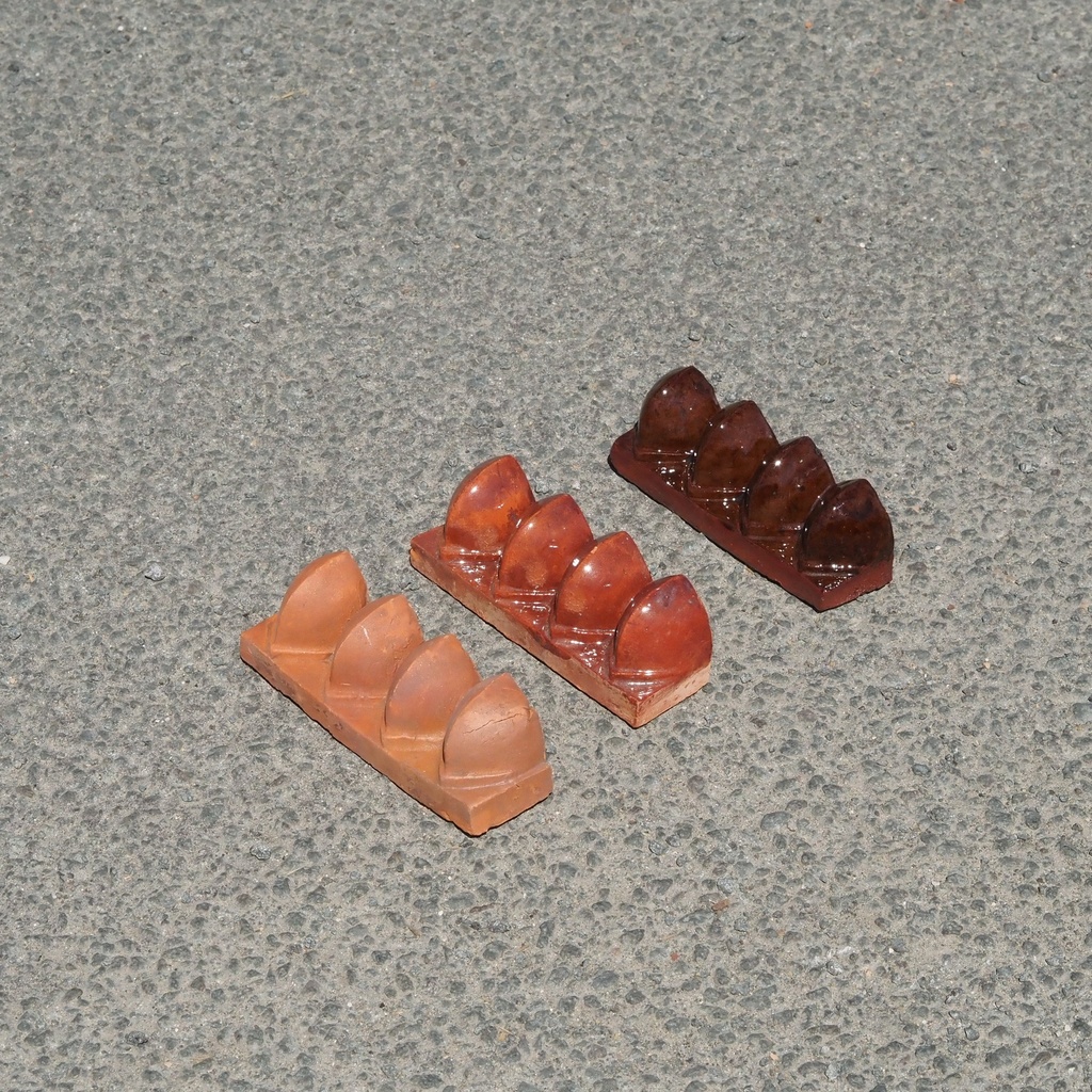 Embossed handmade tile in terracotta by Emery&Cie (13,5 x 4,5 cm) - Banana flower