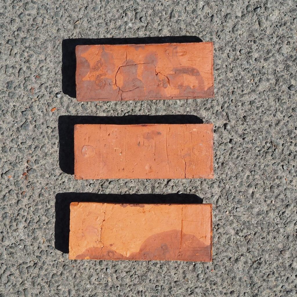 Embossed handmade tile in terracotta by Emery&Cie (14 x 5,5 cm) - Wave