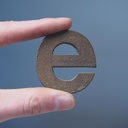 Letter 'e' in sand-cast bronze by Jules Wabbes from the Générale de Banque