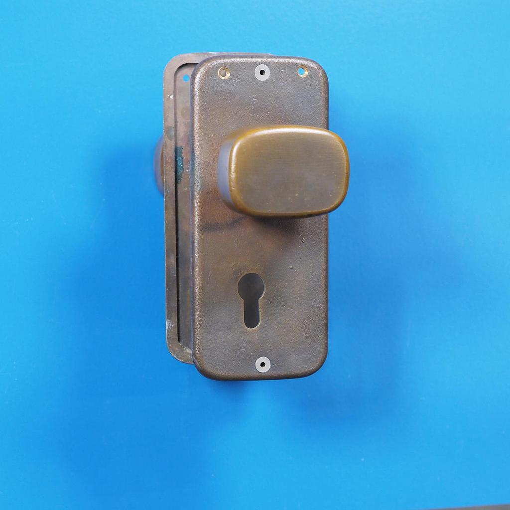 Double door pull handle with key and fixing holes in sand-cast bronze by Jules Wabbes from the Générale de Banque - Fixed (Right/Left)